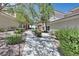 Well-maintained walkway surrounded by lush landscaping and mature trees at 10640 Amber Ridge Dr # 101, Las Vegas, NV 89144