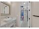 Bathroom featuring decorative tile in the shower, and modern fixtures at 1404 Reisling Ct, Las Vegas, NV 89144
