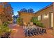 Inviting courtyard featuring a giant chess set, comfortable seating, and lush landscaping at 1404 Reisling Ct, Las Vegas, NV 89144