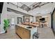 Open-concept great room with modern island, dining area, and seamless indoor-outdoor living at 1404 Reisling Ct, Las Vegas, NV 89144
