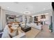 Spacious living room with open floor plan connecting to the kitchen and dining area for easy entertaining at 1404 Reisling Ct, Las Vegas, NV 89144