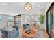 Bright and airy loft features stylish decor, hardwood floors, and railing with natural light for a modern aesthetic at 1404 Reisling Ct, Las Vegas, NV 89144