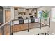 Upstairs office features custom built-ins, a shared desk, and lots of light at 1404 Reisling Ct, Las Vegas, NV 89144