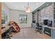 Home office with custom built-ins, a large window, and multiple desks at 1404 Reisling Ct, Las Vegas, NV 89144