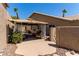A covered patio with seating offers a perfect spot for outdoor relaxation and entertainment at 1761 Summerwood Cir, Henderson, NV 89012