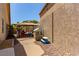 The backyard has a playhouse, picnic table, and gazebo for outdoor relaxation and entertaining at 1761 Summerwood Cir, Henderson, NV 89012