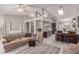 Open-concept living room boasts high ceilings and lots of natural light, creating an inviting atmosphere at 1761 Summerwood Cir, Henderson, NV 89012