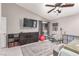 A comfortable main bedroom features a high ceiling, recessed lighting, and a sliding glass door to the outside at 1761 Summerwood Cir, Henderson, NV 89012