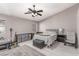 Cozy main bedroom features a ceiling fan and neutral decor, offering a relaxing retreat at 1761 Summerwood Cir, Henderson, NV 89012