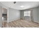 This bedroom features wood floors, neutral painted walls, and a window with curtains at 198 Winterport St, Henderson, NV 89074
