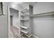 Open closet featuring built-in shelves and a clothing rod at 198 Winterport St, Henderson, NV 89074