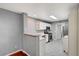 Modern kitchen features stainless appliances and easy access to living area at 198 Winterport St, Henderson, NV 89074