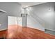 Spacious living room featuring a staircase, hardwood floors, and neutral paint at 198 Winterport St, Henderson, NV 89074