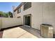 Private patio with slider and HVAC unit at 198 Winterport St, Henderson, NV 89074
