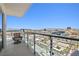 Balcony area with an outdoor chair overlooking a city skyline with mountain views at 200 Hoover Ave # 1813, Las Vegas, NV 89101