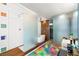Bathroom featuring contemporary design with a modern vanity, standalone tub and vibrant floor at 200 Hoover Ave # 1813, Las Vegas, NV 89101