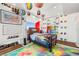 Unique bedroom with colorful artwork and city views at 200 Hoover Ave # 1813, Las Vegas, NV 89101