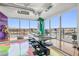 Bright dining area with city views and access to balcony at 200 Hoover Ave # 1813, Las Vegas, NV 89101