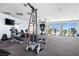 Fully-equipped community gym featuring treadmills, weight machines and city views at 200 Hoover Ave # 1813, Las Vegas, NV 89101