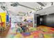Open-concept living space with art and unique features plus open kitchen at 200 Hoover Ave # 1813, Las Vegas, NV 89101