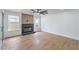 Bright living room with hardwood floors and modern fireplace, illuminated with natural light at 2107 Fountain Springs Dr, Henderson, NV 89074