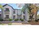 The exterior of this building features a central staircase and well-maintained landscaping at 2615 W Gary Ave # 2061, Las Vegas, NV 89123