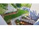 Outdoor walkway featuring concrete paths, grassy area and trees at 2615 W Gary Ave # 2061, Las Vegas, NV 89123