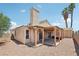 Charming home featuring a backyard with a covered patio and gravel landscaping at 2717 Pastel Ave, Henderson, NV 89074