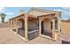 This backyard features a covered patio, gravel, and low-maintenance landscaping at 2717 Pastel Ave, Henderson, NV 89074