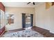 Bright bedroom featuring wood floors, sliding glass door, and neutral paint at 2717 Pastel Ave, Henderson, NV 89074