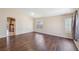Spacious living room featuring beautiful floors, neutral-toned walls, and plentiful natural light at 2717 Pastel Ave, Henderson, NV 89074