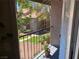 View from balcony overlooking landscaping and the exterior of another unit at 2750 S Durango Dr # 2141, Las Vegas, NV 89117