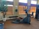 Well-lit gym area with exercise equipment and a 'No Smoking' sign for a healthy workout environment at 2750 S Durango Dr # 2141, Las Vegas, NV 89117