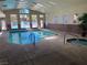 Bright indoor pool and jacuzzi area with multiple windows providing a view of the outdoors at 2750 S Durango Dr # 2141, Las Vegas, NV 89117
