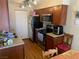 Well-equipped kitchen with wood cabinets, stainless steel appliances, and tile floor at 2750 S Durango Dr # 2141, Las Vegas, NV 89117