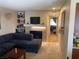 A living room leads into another room with a fireplace and decor at 2750 S Durango Dr # 2141, Las Vegas, NV 89117