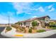 Charming single-story home with desert landscaping and a well-maintained exterior in a sunny setting at 2845 Mincio St, Henderson, NV 89044