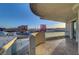 Private balcony with glass railing and panoramic city views at 2877 Paradise Rd # 2105, Las Vegas, NV 89109