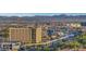 Expansive cityscape with buildings, a monorail, and distant mountains creating a vibrant urban panorama at 2877 Paradise Rd # 2105, Las Vegas, NV 89109