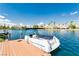 Waterfront property with personal boat docked at the private pier, perfect for boating and relaxation at 2920 Sterling Cove Dr, Las Vegas, NV 89128
