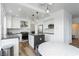 Beautiful kitchen with stainless steel appliances, a center island, and stylish pendant lighting at 2920 Sterling Cove Dr, Las Vegas, NV 89128