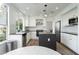 Bright, modern kitchen featuring an island, stainless steel appliances, and ample cabinet space at 2920 Sterling Cove Dr, Las Vegas, NV 89128