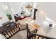 Open-concept living space with wood floors and a dining area at 2920 Sterling Cove Dr, Las Vegas, NV 89128