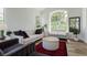 Cozy living room with neutral furniture, large windows, and modern decor at 2920 Sterling Cove Dr, Las Vegas, NV 89128
