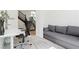 Office space with an adjacent stairway and comfortable sofa, perfect for working from home at 2920 Sterling Cove Dr, Las Vegas, NV 89128