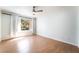 Bedroom with new floors, ceiling fan, and natural light at 3060 Tarpon Dr # 104, Las Vegas, NV 89120