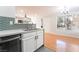 Modern kitchen with stainless appliances open to a bright living area at 3060 Tarpon Dr # 104, Las Vegas, NV 89120