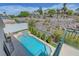 Relaxing backyard pool and spa with lush landscaping create a private oasis at 3079 Evening Mist Ave, Henderson, NV 89052
