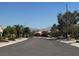 View of quiet residential street with well-maintained homes and mountain views at 3104 Birch Grove Ct, Las Vegas, NV 89134