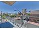 A balcony overlooking downtown with palm trees and views of buildings at 353 E Bonneville Ave # 313, Las Vegas, NV 89101